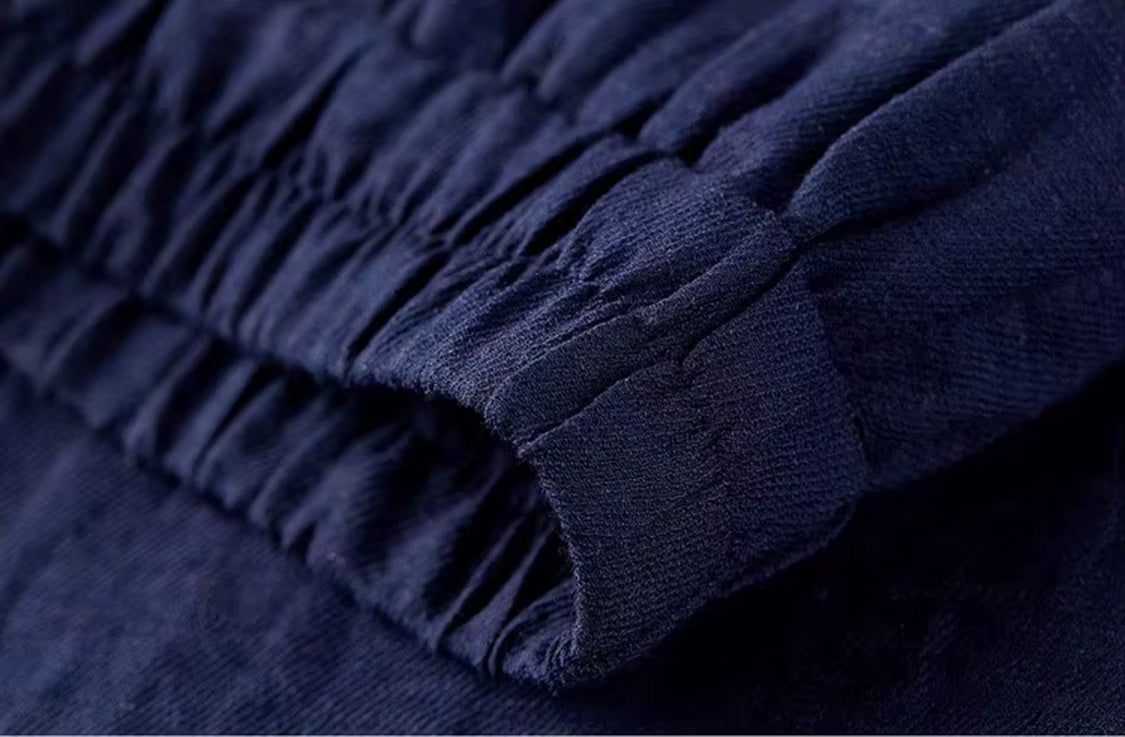 Close-up of the comfortable, enclosed elasticated waistband on the viscose-linen blend skirt in Shurima Oasis — From Borcelleclothes.