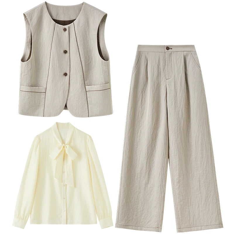 Still life arrangement of the velvet truffle vest, trousers, and elderflower fizz blouse, showing the full ensemble — From Borcelleclothes.