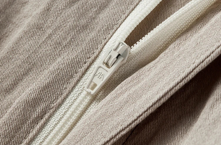 Detailed shot of the zipper fly and high-quality finish on the velvet truffle trousers — From Borcelleclothes.