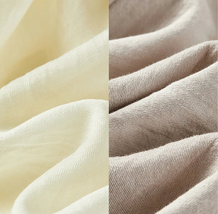 Close-up of wave-stitch embroidery and the crinkled, forest-born texture of the velvet truffle viscose — From Borcelleclothes.