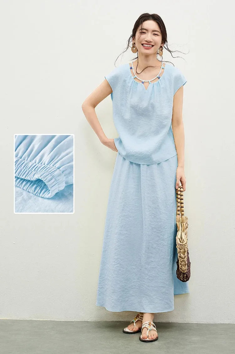 A visual collage featuring a woman’s smile and the skirt’s waistband details — From Borcelleclothes.
