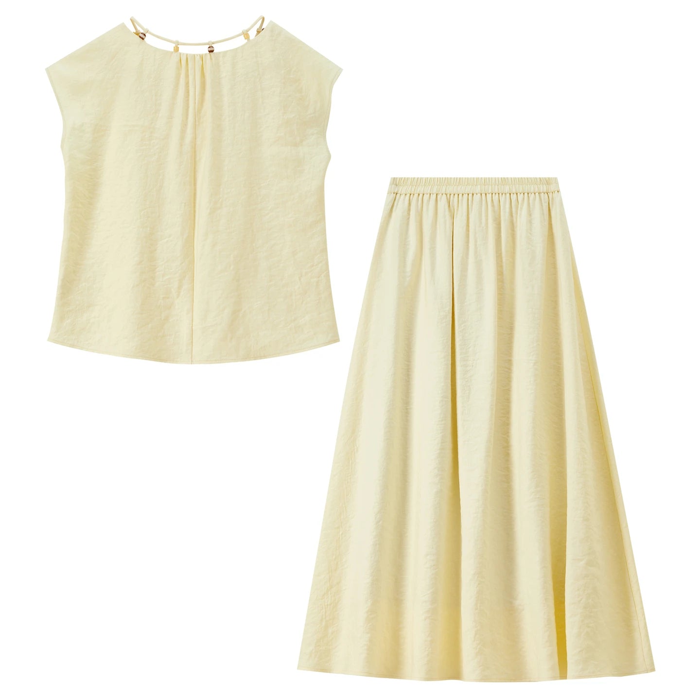 Professional flat lay of the "Her Miracle" viscose set from the back, highlighting the clean construction — From Borcelleclothes.