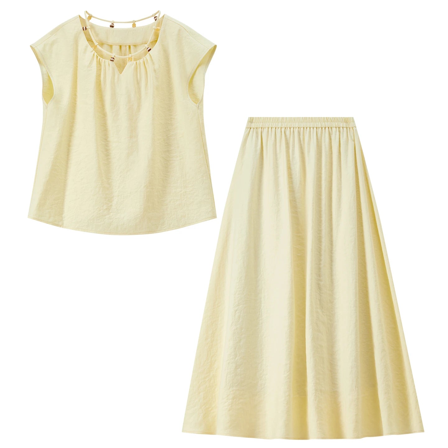 Professional flat lay of the "Her Miracle" top and skirt set in sunny yellow, showing the front design — From Borcelleclothes.