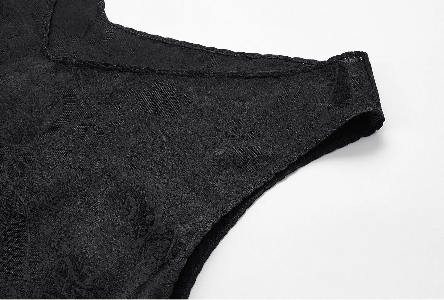 Macro detail of the armhole edge finished with delicate picot lace trim on Freezing Twilight silk jacquard fabric. — From Borcelleclothes.