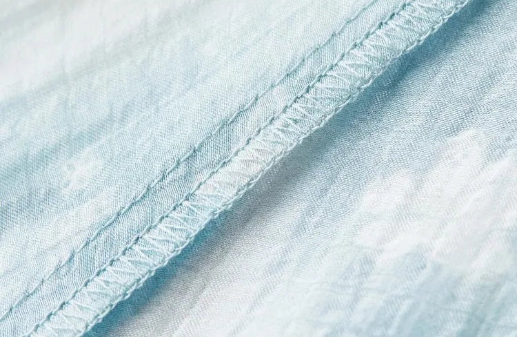 Professional interior overlock stitching on the flared lyocell skirt — From Borcelleclothes.