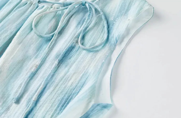 Clean finish of the sleeveless armhole on the lightweight watercolor lyocell top — From Borcelleclothes.