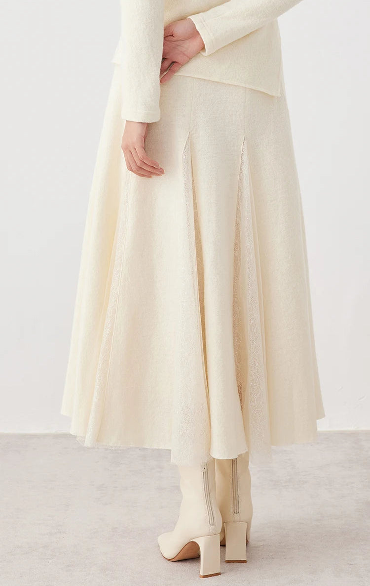 Back view showcasing the structural fit of a women's wool godet skirt with sheer panels in Godet Summer — From Borcelleclothes.