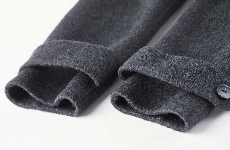 Detail of the long sleeve cuff featuring the partial decorative button tab — From Borcelleclothes.