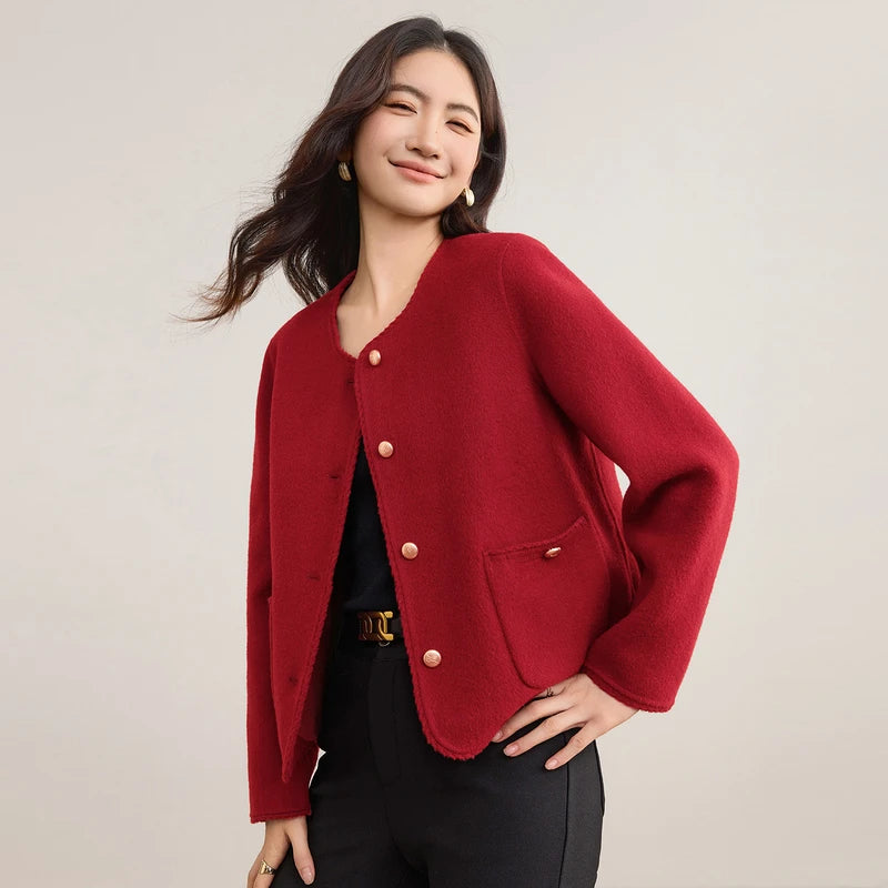 Women's double-sided virgin wool jacket in Betta Crimson. Features include gold-tone embossed buttons, patch pockets, and hand-made Wave Stitch finishing along the edges. — From Borcelleclothes.