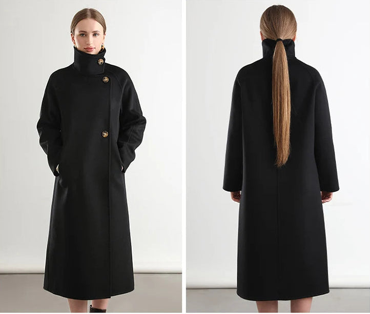 The finale of the collection; a woman in the Kohl Night wrap coat from Borcelleclothes, where the deep black wool meets the quiet of the night.