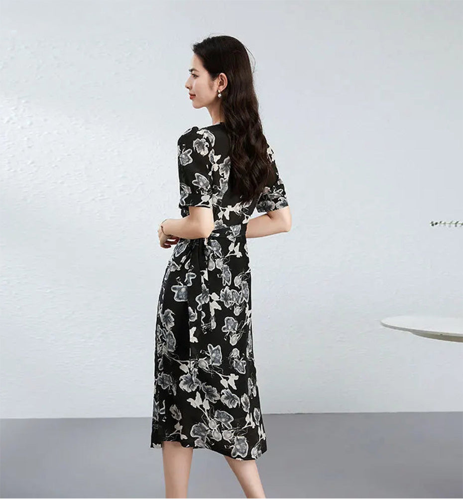 A woman seen from behind looking to the side, capturing the mysterious and poetic mood of "Another Reality" — From Borcelleclothes.