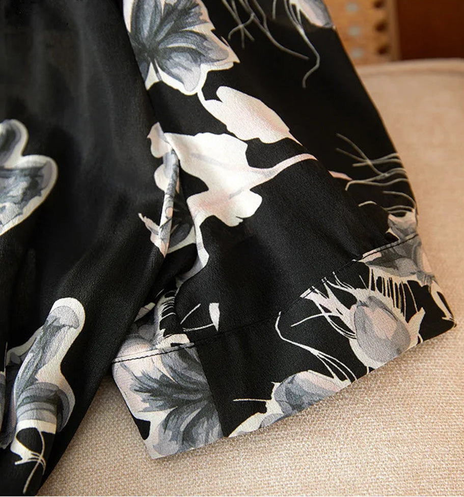 Detailed view of the short set-in sleeve with slightly gathered heads and banded cuffs — From Borcelleclothes.