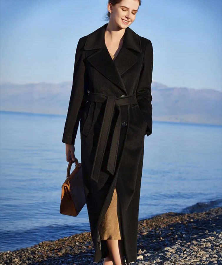 Women's 7/8 Cashmere Blend Coat in Onyx, featuring a double-breasted design, classic notch lapels, an adjustable waist belt, and single-welt pockets, crafted from a blend of cashmere, high-count wool, and Mulberry silk for refined elegance and luxurious comfort. From Borcelleclothes.