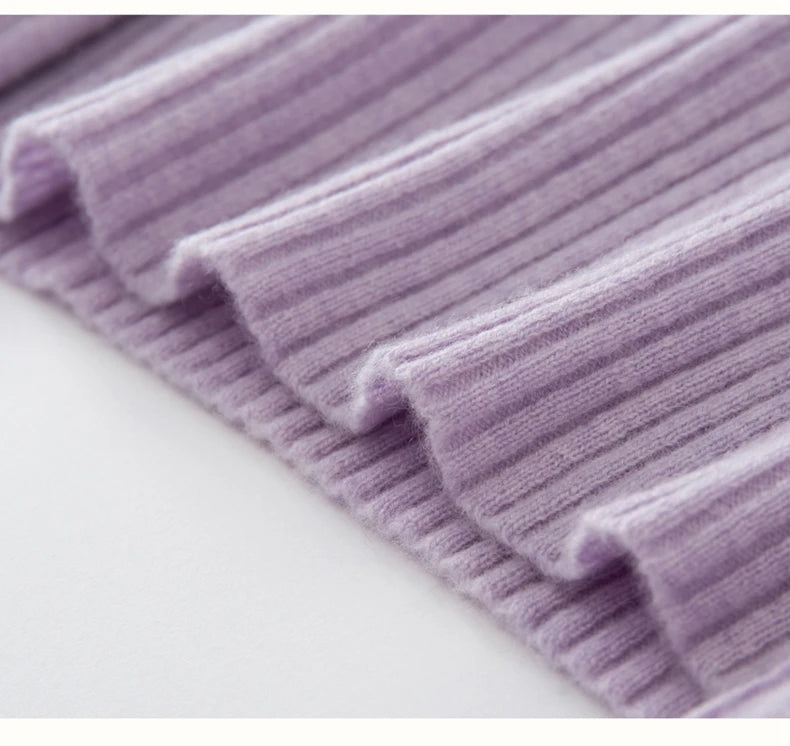 Wide 2x2 ribbed hem gathering the vertical flow in Wisteria Purple — From Borcelleclothes.