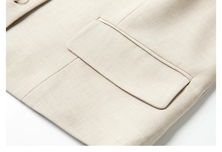 Focused shot of the jacket’s flap pocket, showing tailoring detail. From Borcelleclothes.