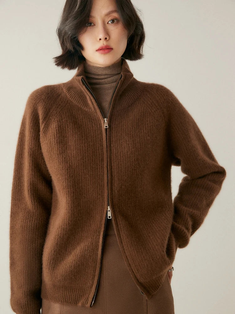 Model resting hand at hip in Irish Coffee Alashan cashmere cardigan — From Borcelleclothes.