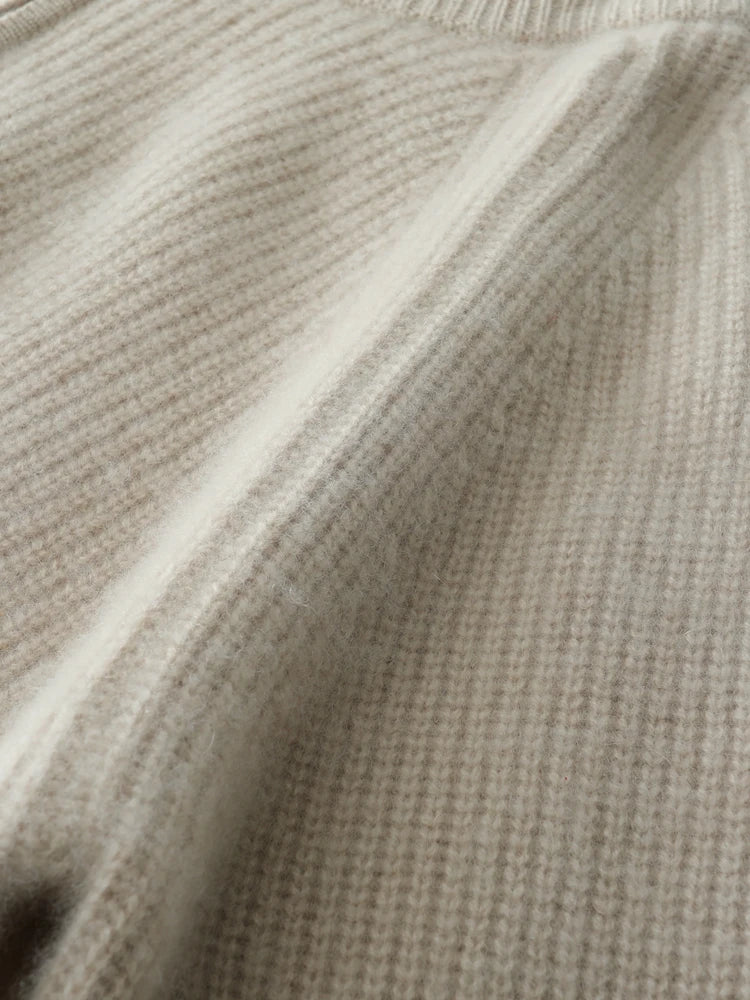 Detail of raglan seams on Pale Silver Alashan cashmere cardigan — From Borcelleclothes.