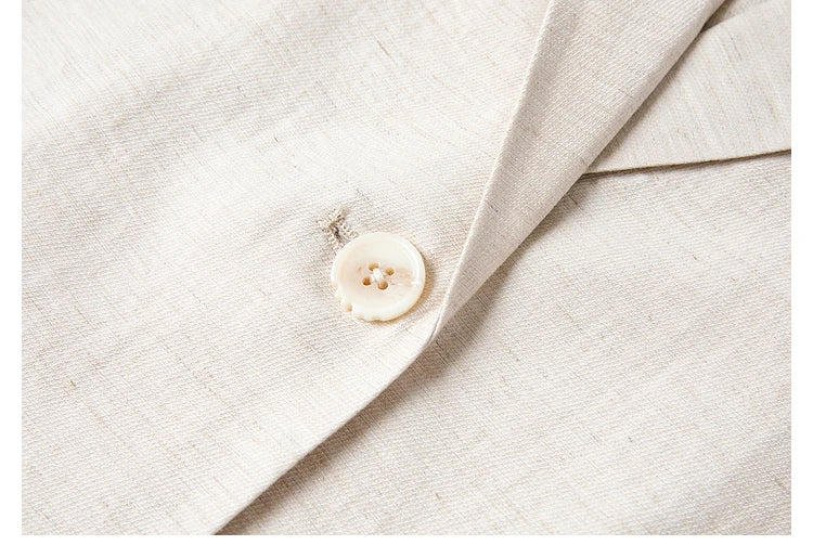 Close-up of the Bon Jour blazer’s matching button, designed for minimalist cohesion. From Borcelleclothes.