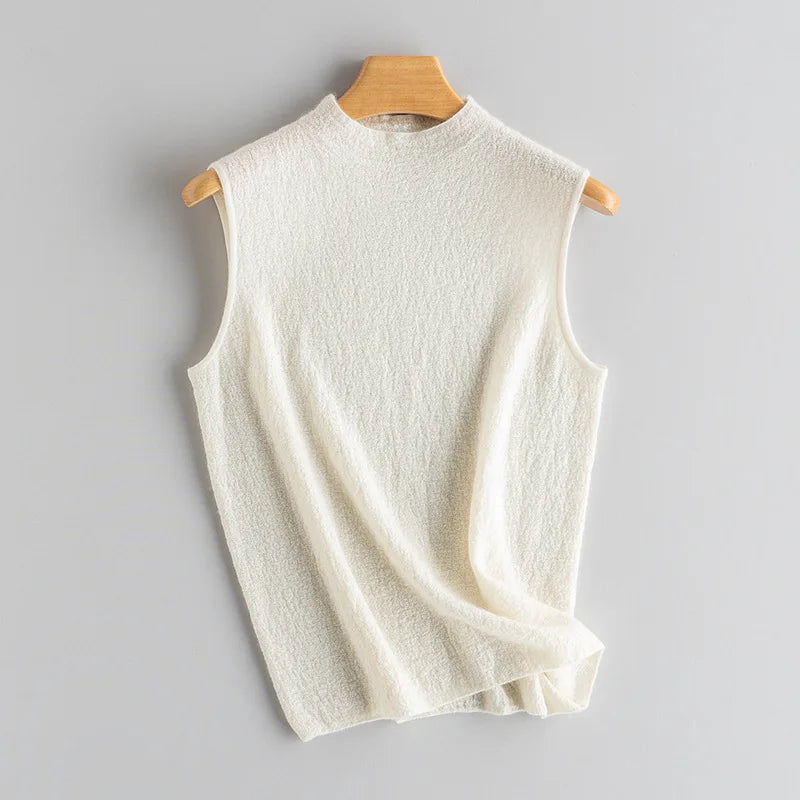 Women's Bouclé cashmere sleeveless top in a slim silhouette with mock neck, shown in Pearl Bush — From Borcelleclothes.