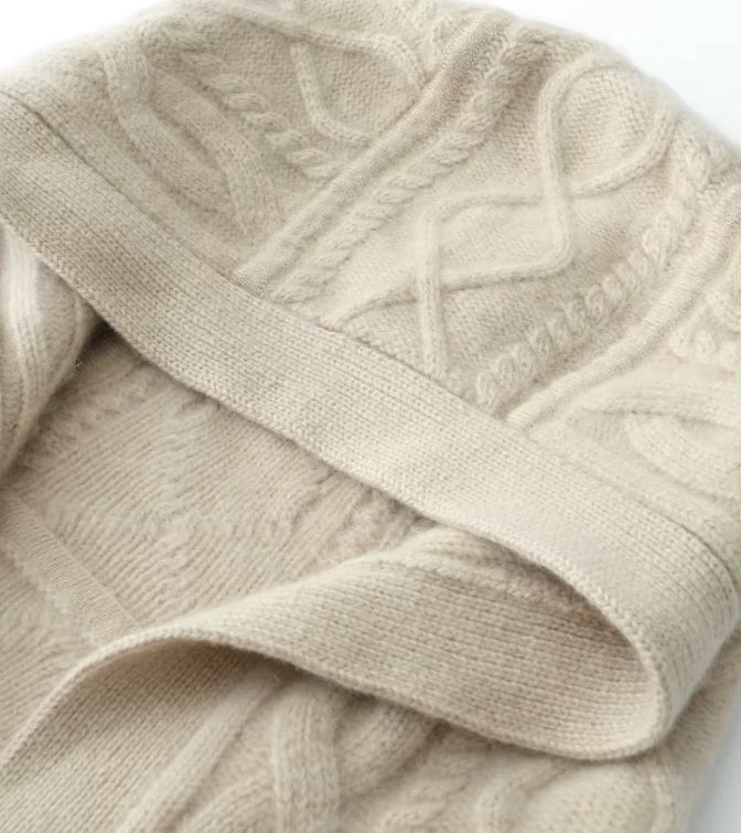The integrated hood on the women's Cable-Knit Cashmere Wool Coat in Pearl Bush, showcasing the intricate cable-knit texture and modern design, Borcelleclothes.