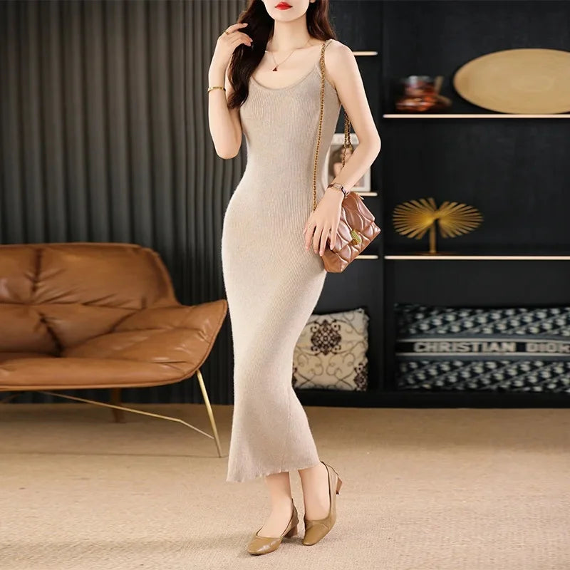 Women's ankle-length camisole dress in Vanilla made of ribbed Australian wool with slender straps and a slim silhouette. From Borcelleclothes.