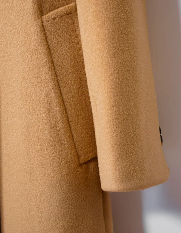 The welt pocket and sleeve on the Women's Cashmere Blend Long Coat in Clay Brown, emphasizing functional elegance and craftsmanship. From Borcelleclothes.