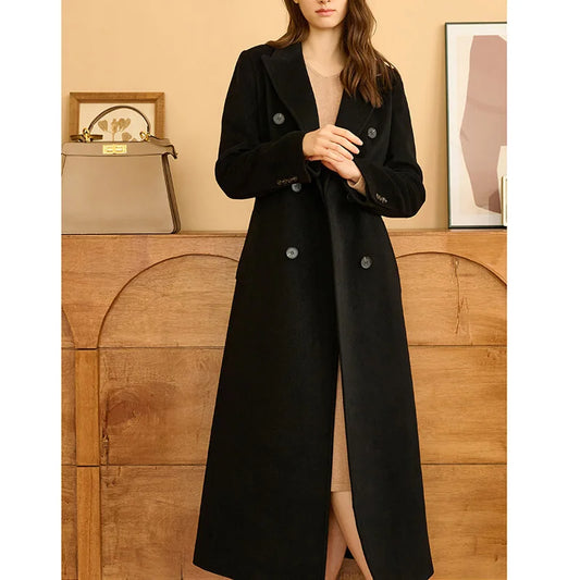 Women's Cashmere Blend Long Coat in Onyx, featuring a minimalist double-breasted front, princess seamings at the back, and a center back vent, crafted from a luxurious blend of Mongolian cashmere and high-count wool for modern elegance and comfort.  From Borcelleclothes.  
