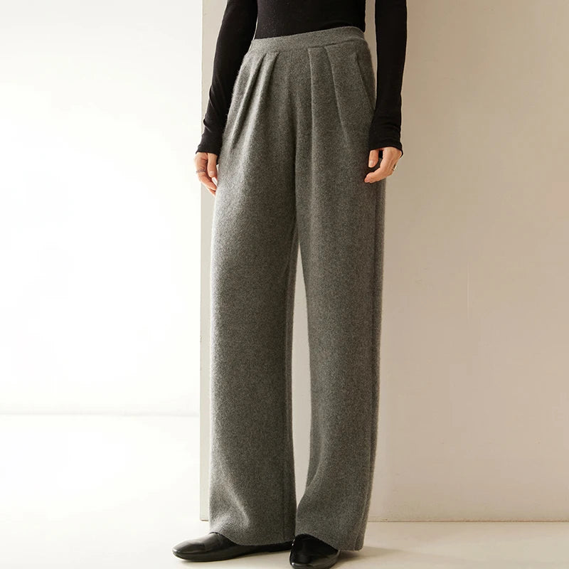 Women's Cashmere Pleated Trousers in Flint, with four front pleats and a structured waistband — From Borcelleclothes.