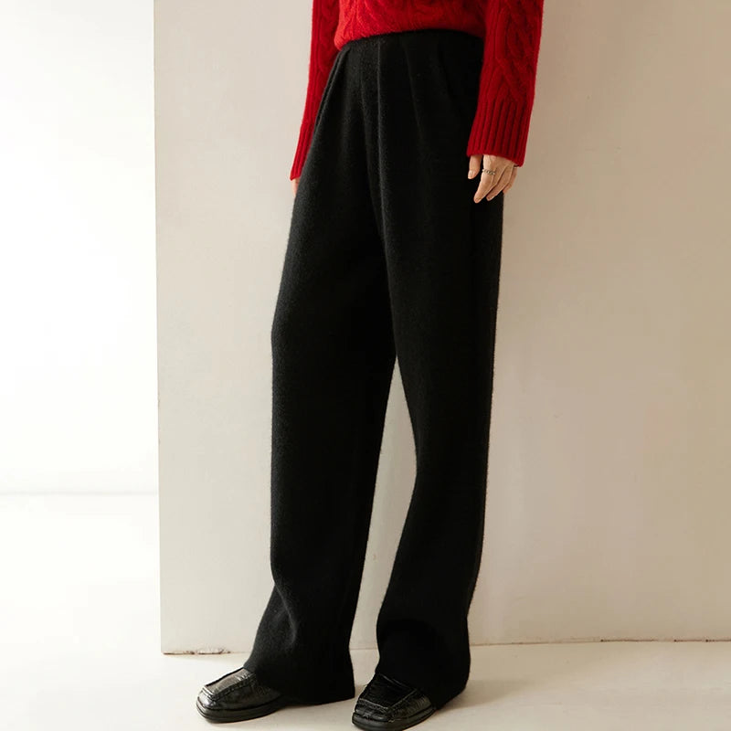 Women's Cashmere Pleated Trousers in Onyx, with four front pleats and a structured waistband — From Borcelleclothes.