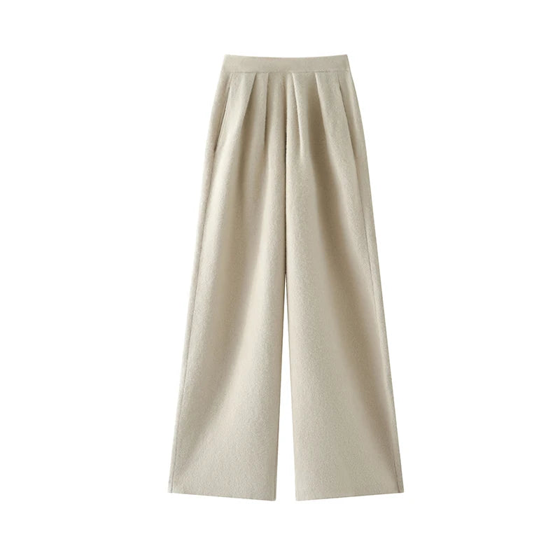 Front draping of Soft Amber cashmere pleated trousers — From Borcelleclothes.