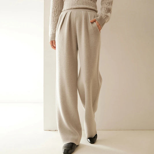 Women's Cashmere Pleated Trousers in Soft Amber, with four front pleats and a structured waistband — From Borcelleclothes.