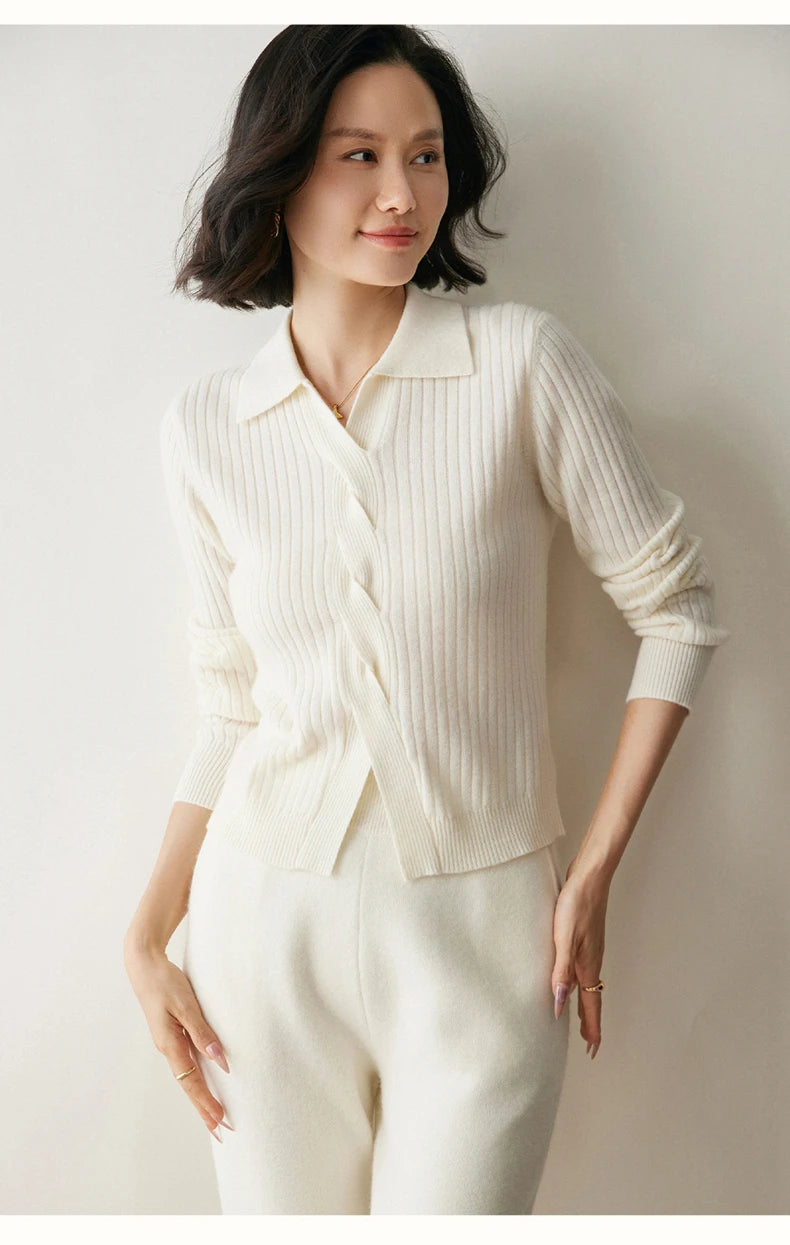 Model with hands on hips wearing women’s cashmere rib sweater in Pearl Bush — From Borcelleclothes.