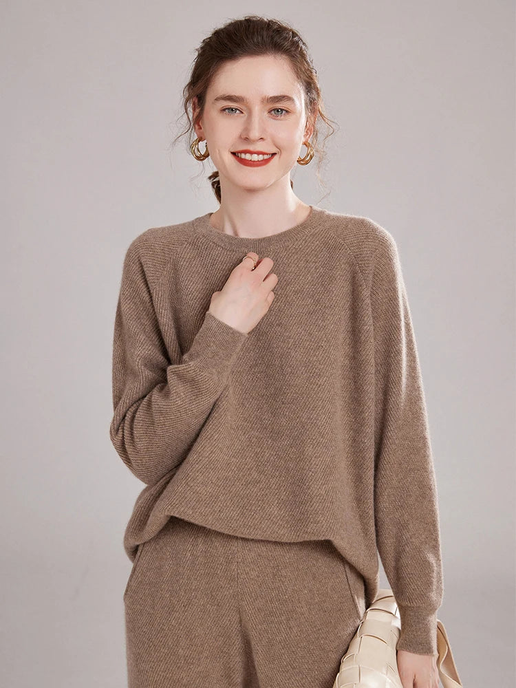 Women’s cashmere set in diagonal knit texture with relaxed sweater and straight-leg pants — shown in color Pastel Brown. From Borcelleclothes.