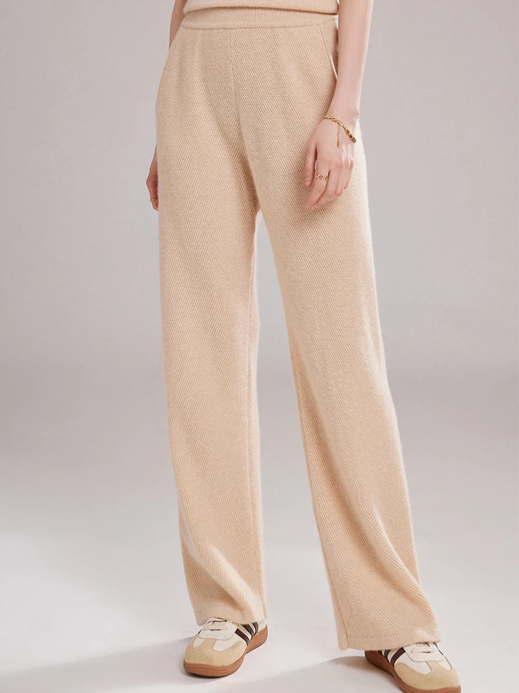 Straight-leg pants in Vanilla diagonal-knit cashmere shown on model – From Borcelleclothes.
