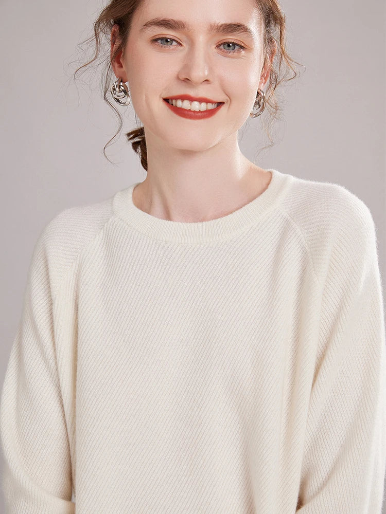 Model wearing the White Coffee cashmere sweater with diagonal texture and ribbed crew neck – From Borcelleclothes.