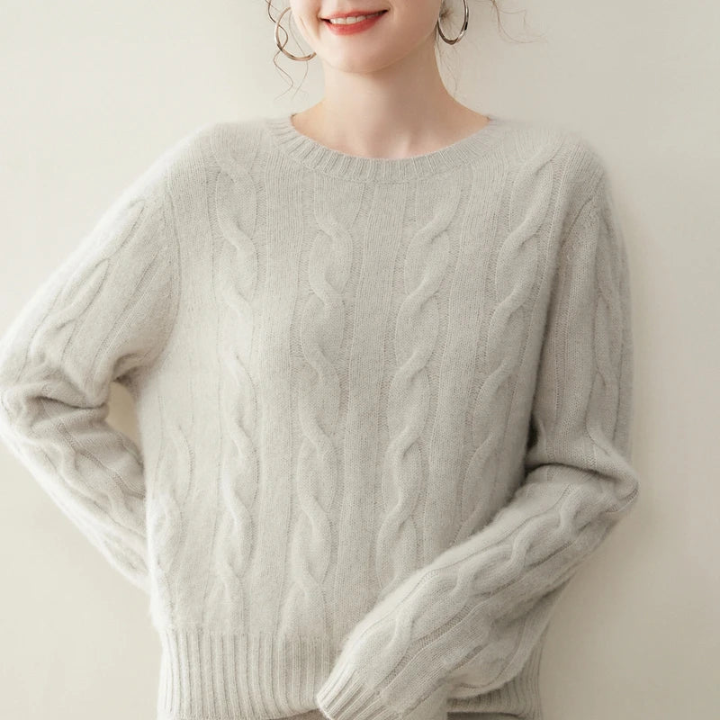 Women's cashmere set with two-strand cables in Cloud, model with hand behind back — From Borcelleclothes.