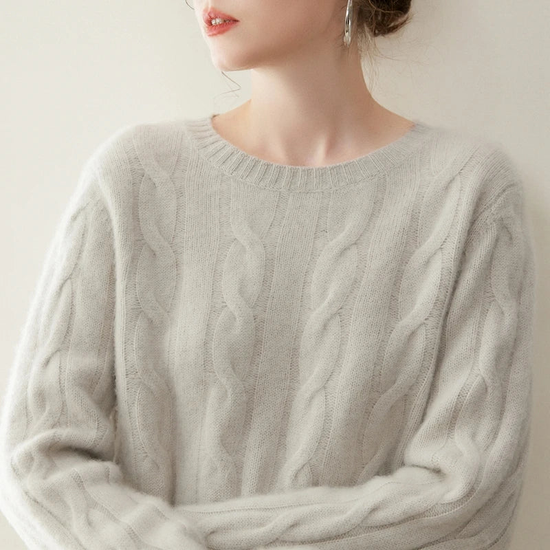 Women's cashmere set with two-strand cables in Cloud, model wearing the sweater — From Borcelleclothes.