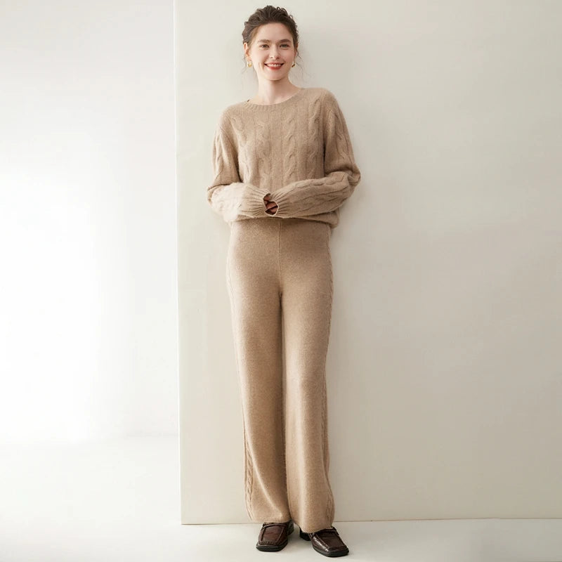 Women's cashmere set with two-strand cables in Pale Taupe, smiling model looking to the side — From Borcelleclothes.