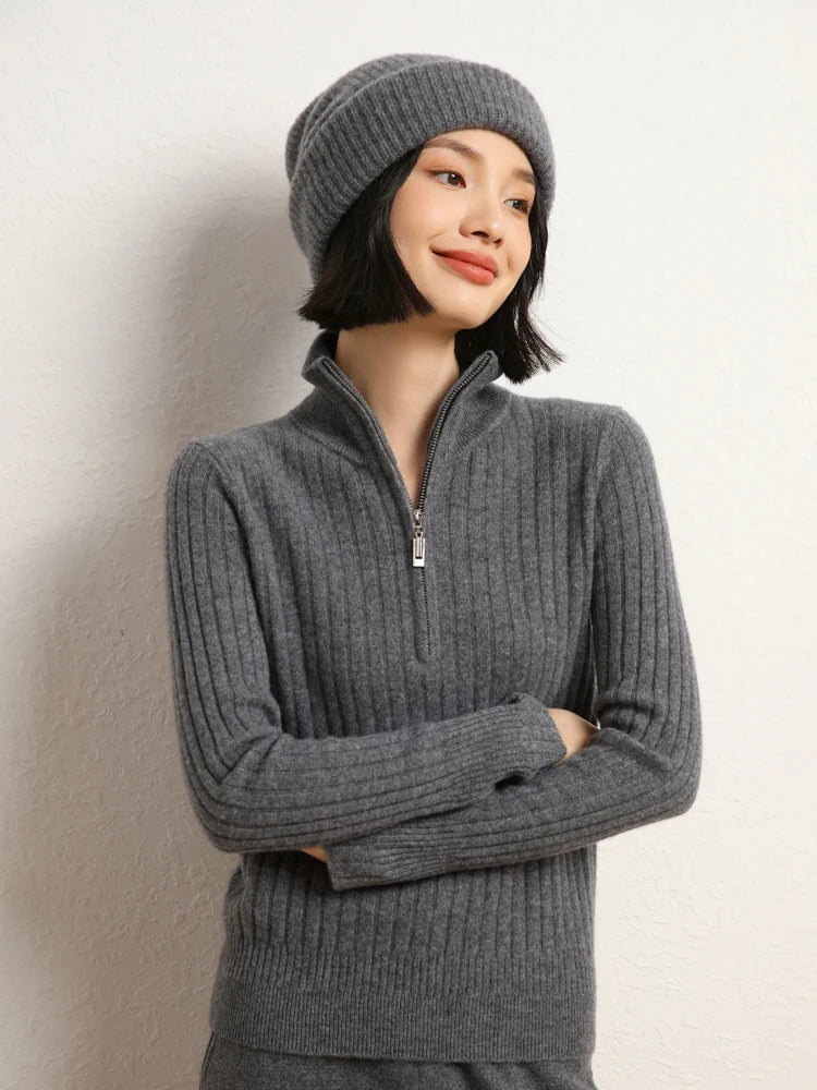 Model with arms crossed wearing cashmere sweater in shifting ribs, Davy Grey — From Borcelleclothes.