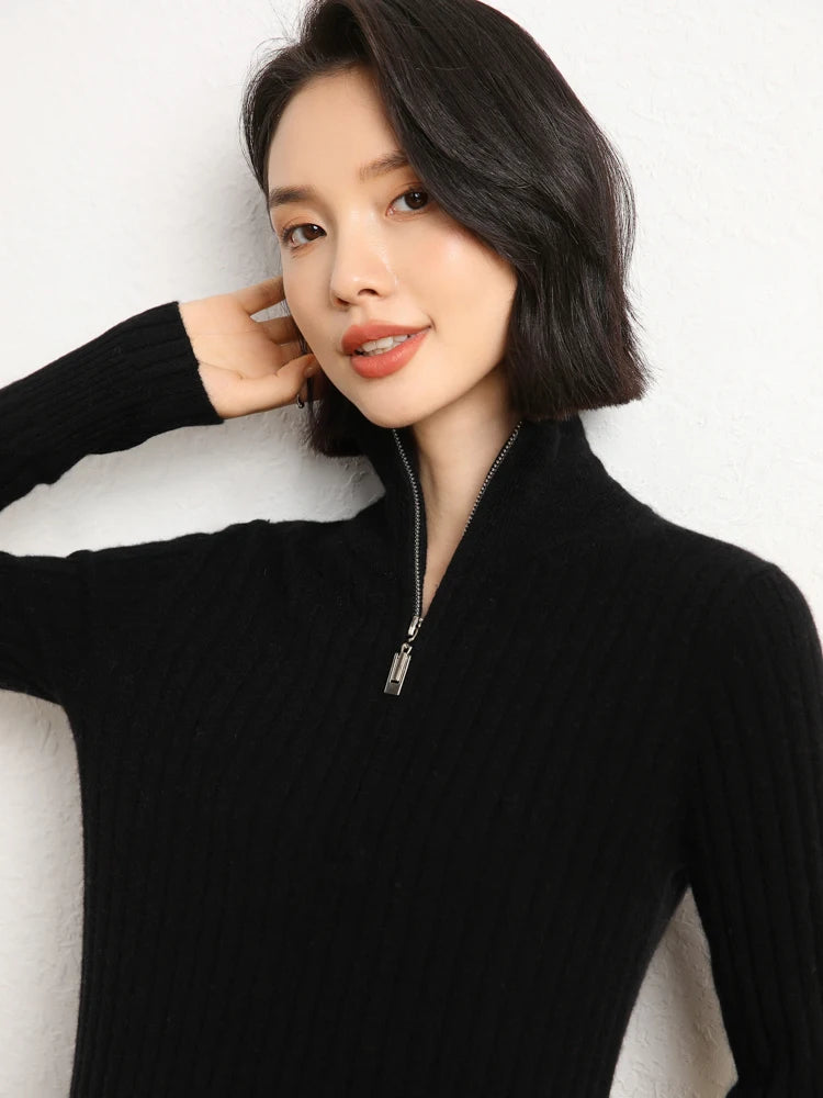 Model touching hair in cashmere sweater in shifting ribs, Onyx — From Borcelleclothes.