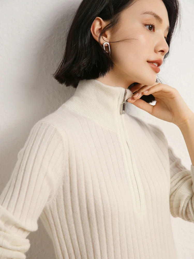 Model touching chin in cashmere sweater in shifting ribs, Pearl Bush — From Borcelleclothes.