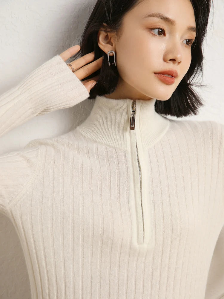Model touching hair in cashmere sweater in shifting ribs, Pearl Bush — From Borcelleclothes.