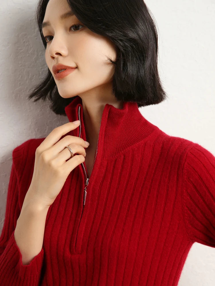 Model touching collar of cashmere sweater in shifting ribs, Sangria — From Borcelleclothes.