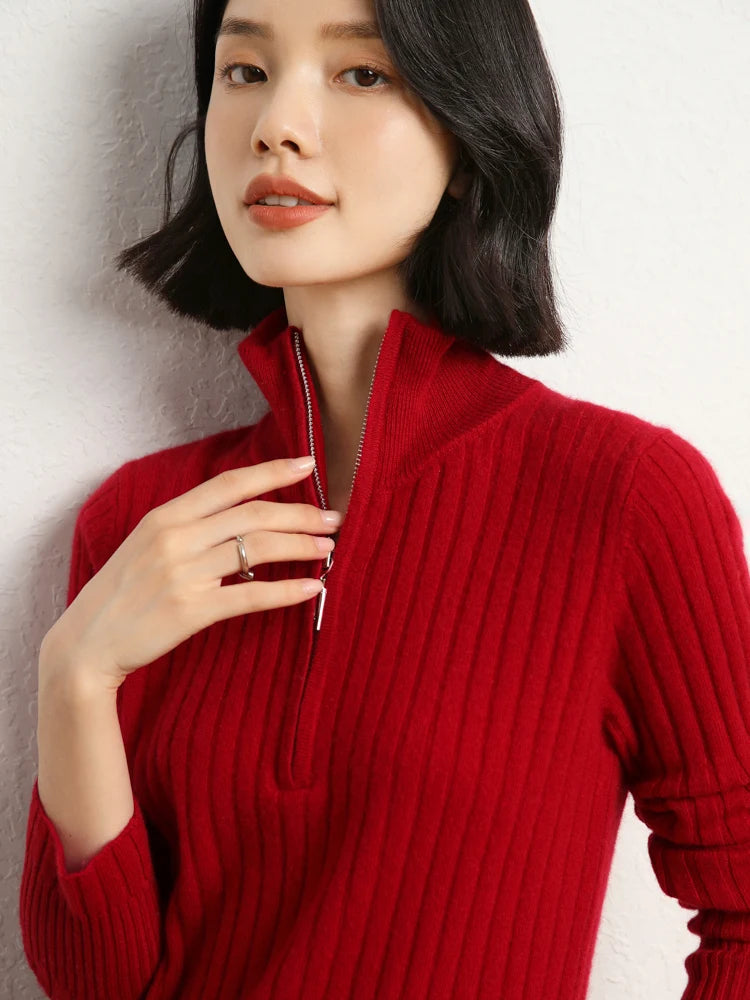Model touching zipper in cashmere sweater in shifting ribs, Sangria — From Borcelleclothes.