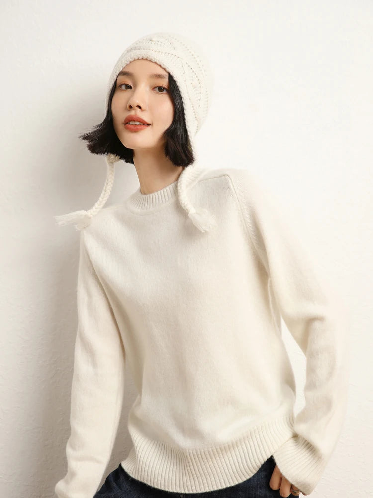 Woman in White Chocolate cashmere sweater turned slightly to the side – From Borcelleclothes.