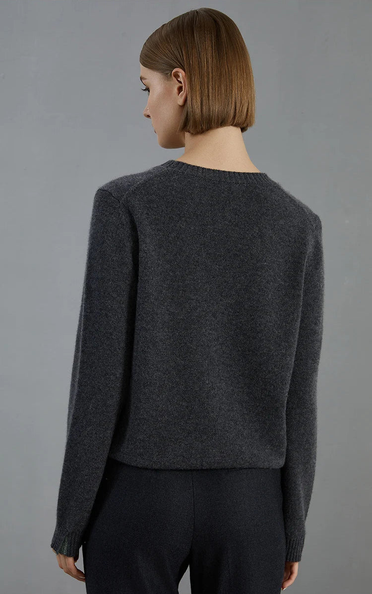 Back view of the Baltic Sea sweater, showing subtle light across the shoulders — From Borcelleclothes.