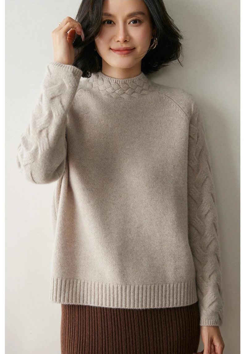 Model in Downy Grey cashmere sweater adjusting hair — From Borcelleclothes.