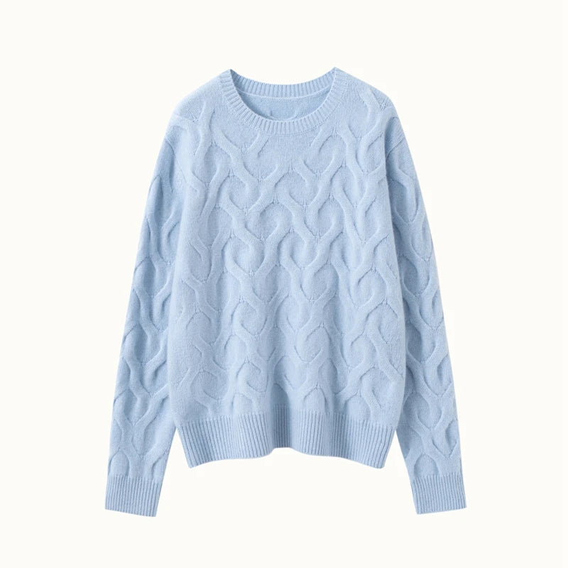 Women's Cashmere sweater in Forget Me Not color, with abstract heart relief, relaxed silhouette, crew neck, and ribbed finishes — available in four soft shades. From Borcelleclothes.