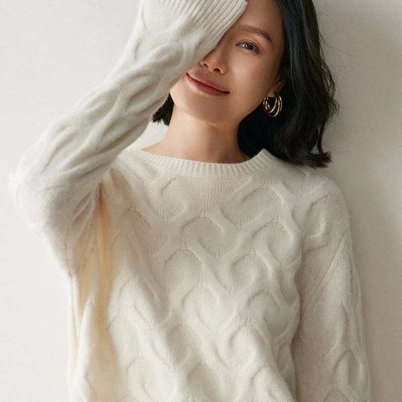 Women's Cashmere sweaterin Silver Pink, with abstract heart relief, relaxed silhouette, crew neck, and ribbed finishes — available in four soft shades. From Borcelleclothes.