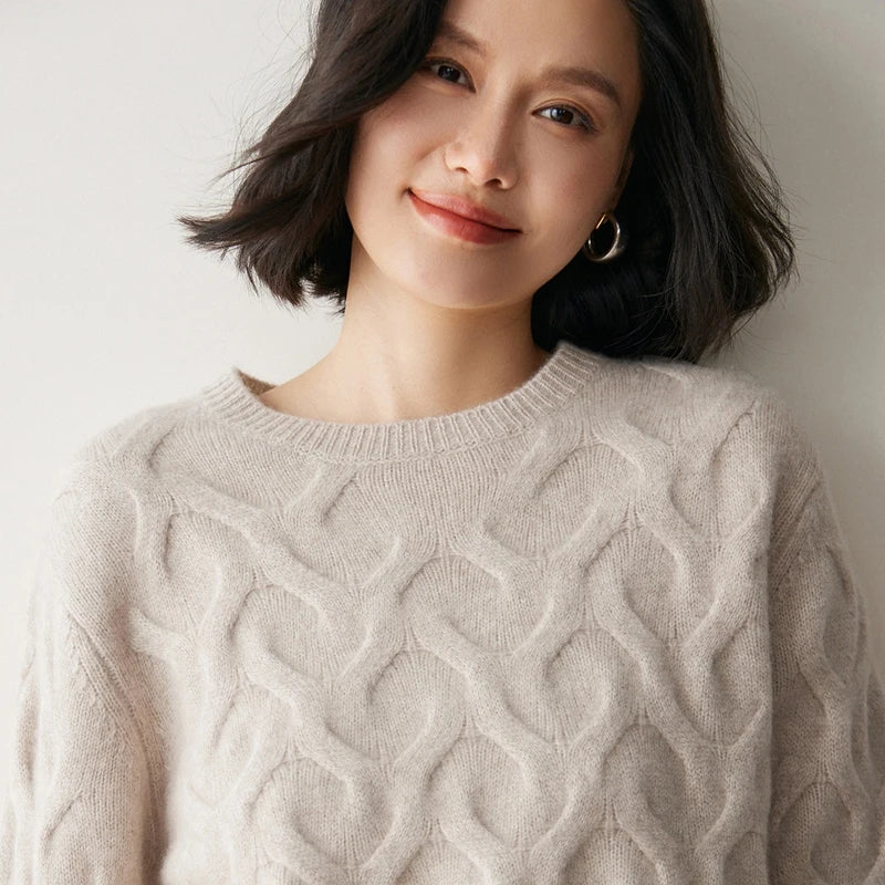 Women's Cashmere sweaterin Silver Pink, with abstract heart relief, relaxed silhouette, crew neck, and ribbed finishes — available in four soft shades. From Borcelleclothes.